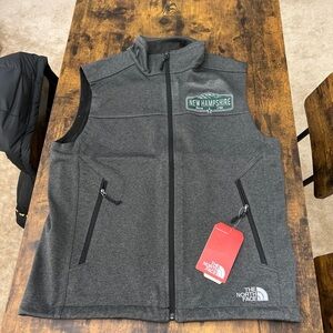 SOLD The North Face, vest, mens medium, embroidered with New Hampshire logo.NWT